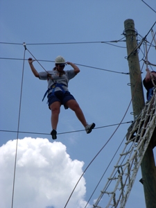 Participants move across the two-line bridge to access the crow's nest. 